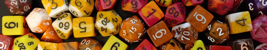 orange and red tabletop RPG dice - TTRPGkids