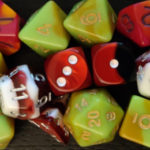 TTRPGkids holiday gift guide - red and green holiday dice