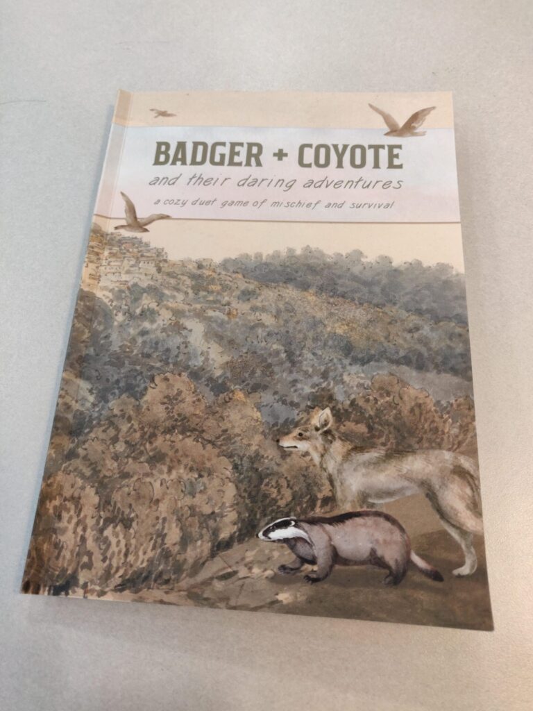 a photo of the cover of Badger + Coyote