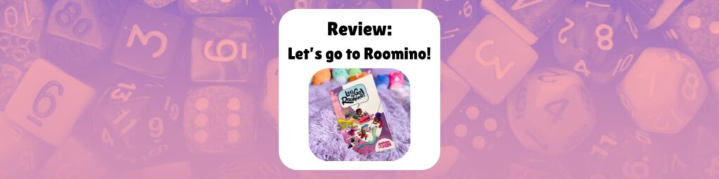 Review: Let’s go to Roomino! shows a photograph of the book on a purple plush blanket