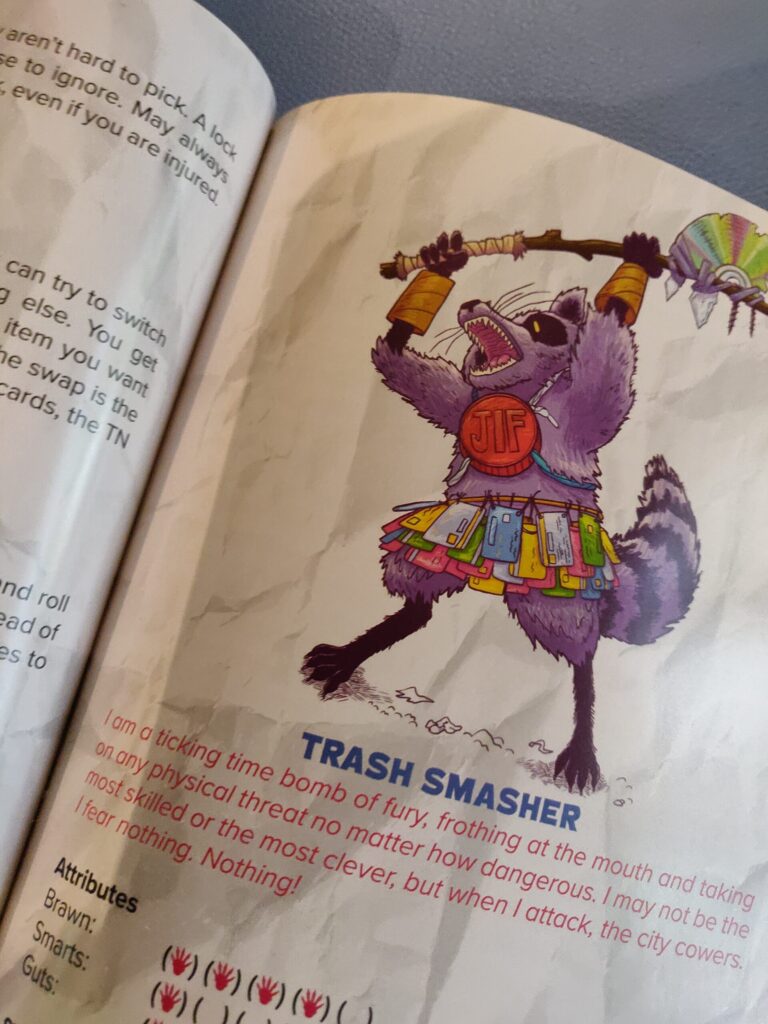 a photo of a page from Garbage & Glory showing a raccoon warrior with an axe made from a pole and a broken CD