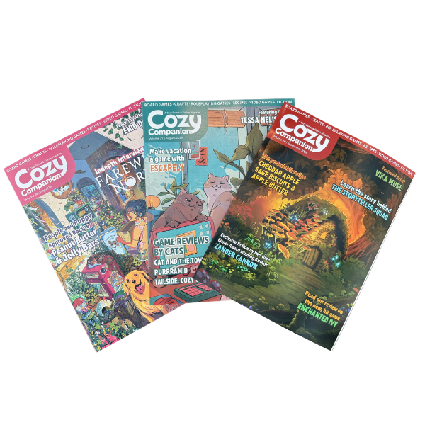 three issues of Cozy companion laid out, one on top of each other